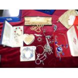 A small quantity of costume jewellery including boxed necklace and earring set with blue glass