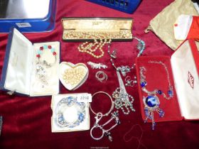 A small quantity of costume jewellery including boxed necklace and earring set with blue glass