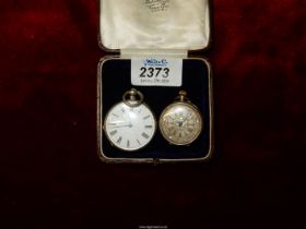 A 'Fine Silver' ladies pocket watch with white enamel face plus a small Swiss silver ladies