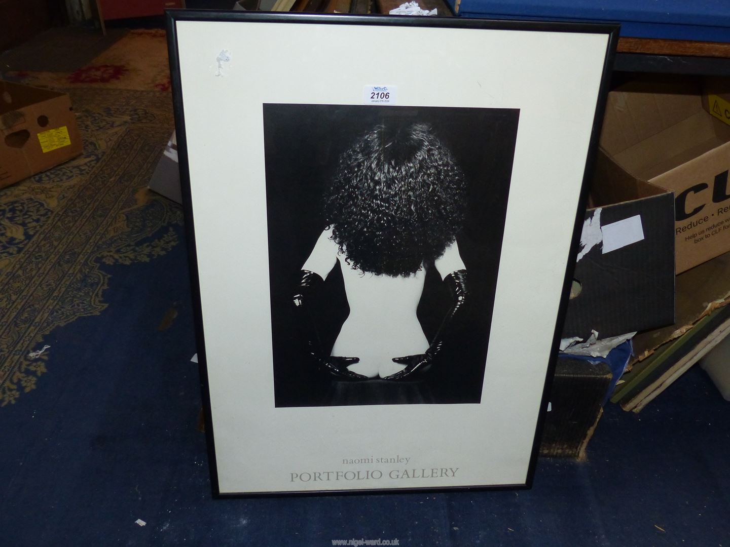 A framed Naomi Stanley Portfolio Gallery Poster, 20 1/2" x 28 1/4".