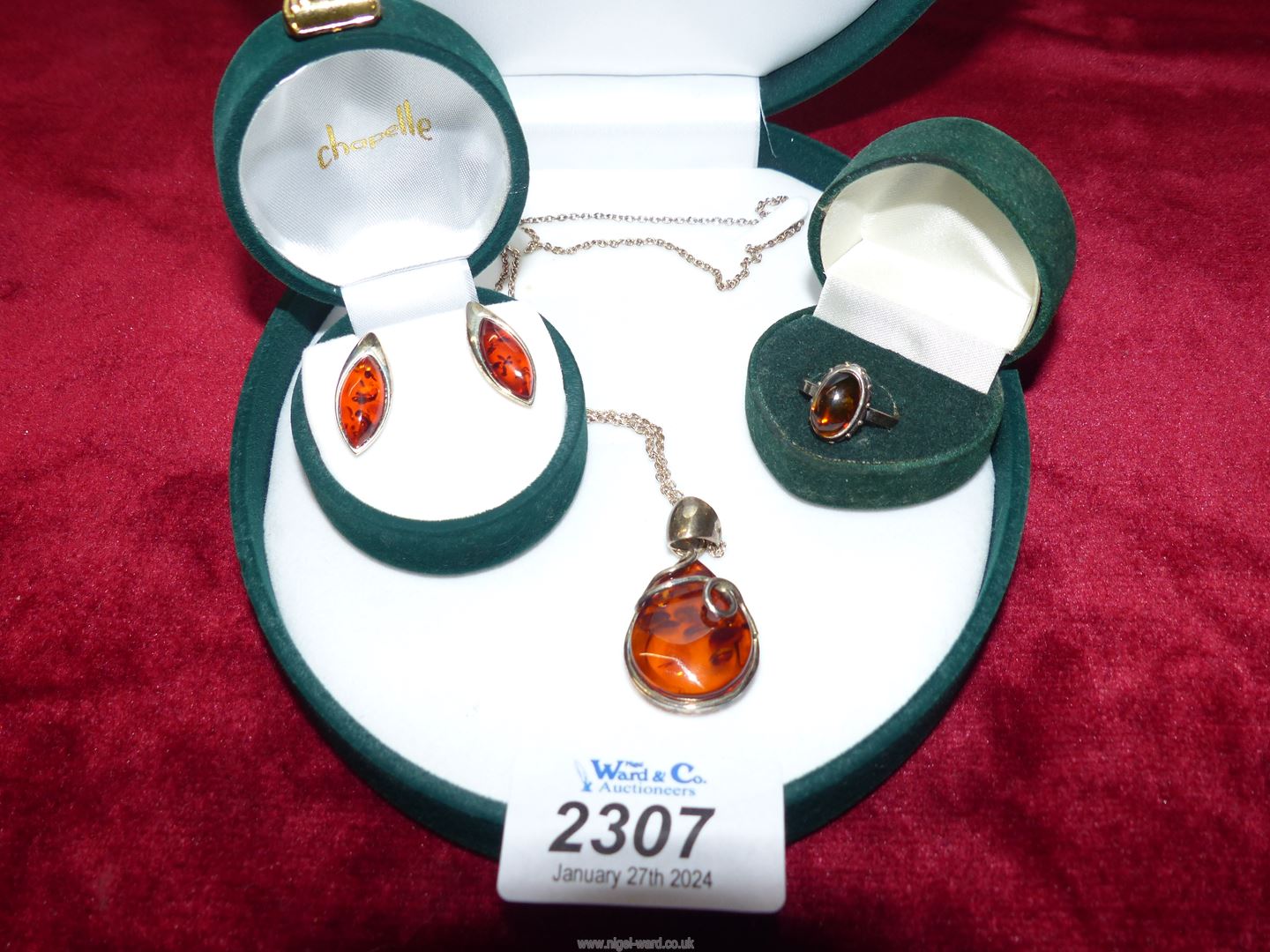 A silver and amber effect pendant, chain and earring set and a 925 silver and amber ring, - Image 2 of 3