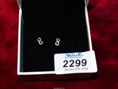 A pair of S925 sterling silver infinity studs, marked ALE, in Pandora box.