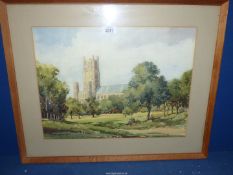 A framed and mounted Watercolour depicting Ely Cathedral, signed lower left C.V.