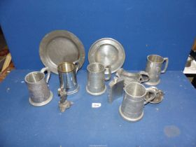 Two Pewter plates, tankards, chambersticks, etc.