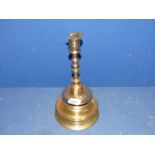 A large brass candlestick, rim a/f., 12 1/2" tall.