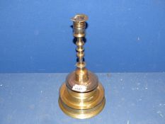 A large brass candlestick, rim a/f., 12 1/2" tall.