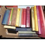 A box of books to include Ella Wheiler Wilcox poems, Rebecca by Daphne Du Maurier,