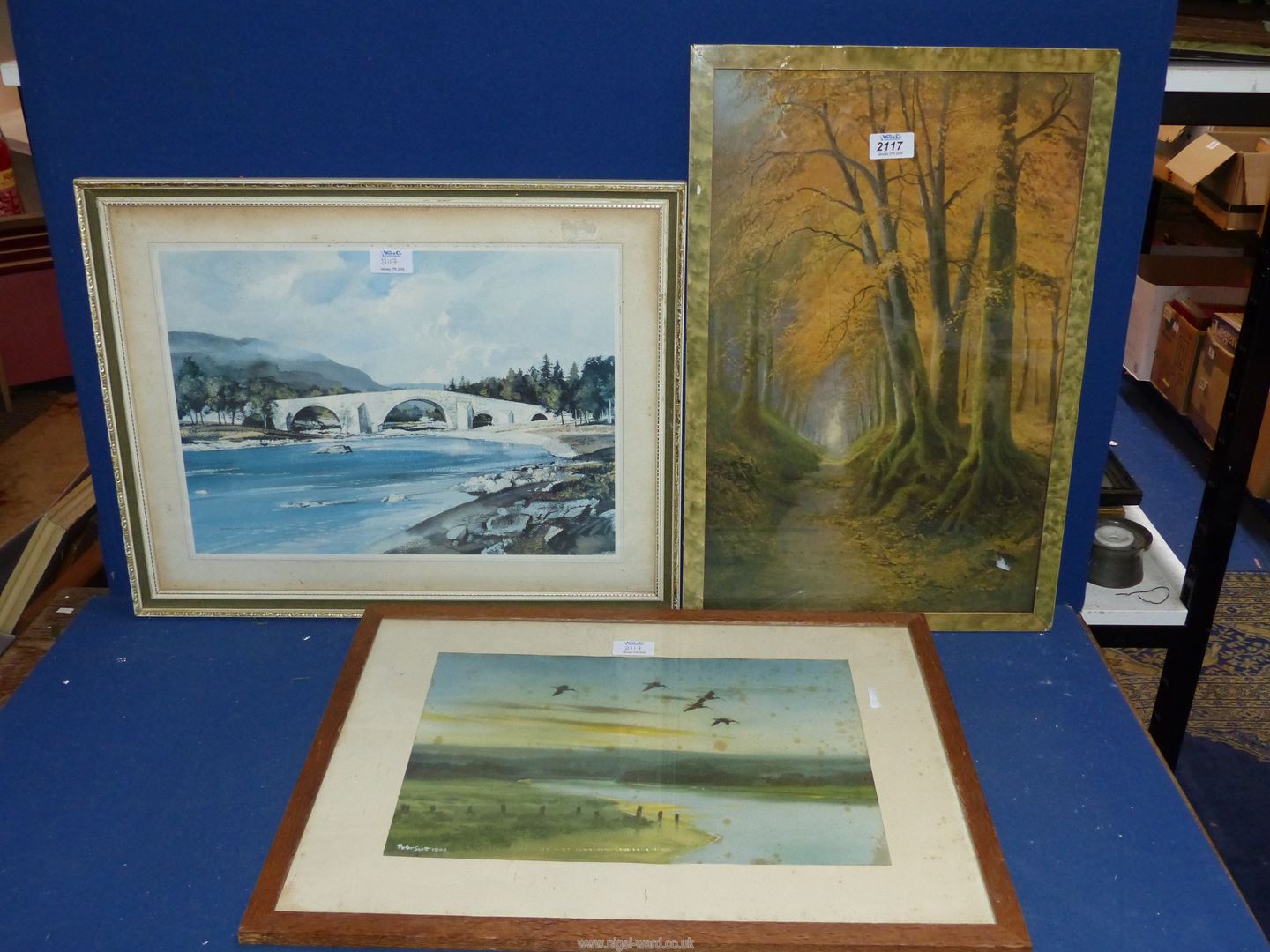 Three Prints to include; a Rowland Hilder river scene, one by Peter Scott and a woodland scene. - Image 2 of 2