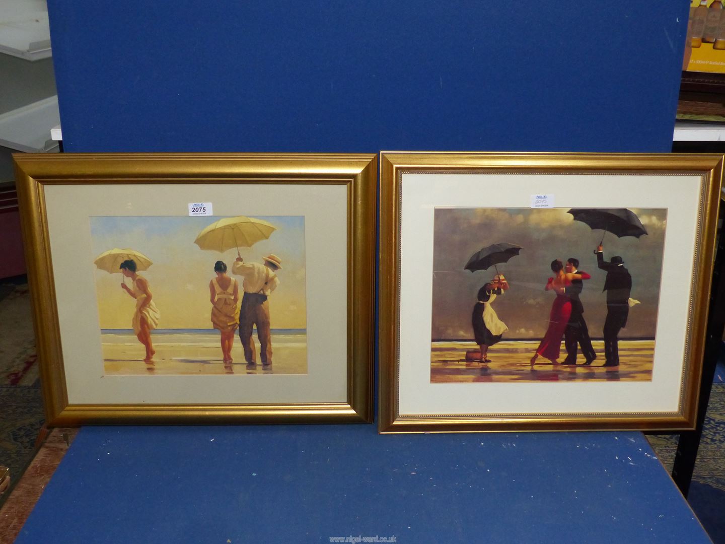 A framed pair of Jack Vettriano Prints titled 'Singing Butler' and 'Mad Dogs'.