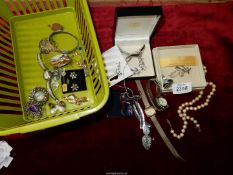 A quantity of miscellaneous costume jewellery, necklaces, watches, brooches, etc.