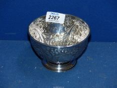 A Silver floral and foliate embossed footed Bowl, Sheffield 1903, makers Fenton Brothers Ltd.