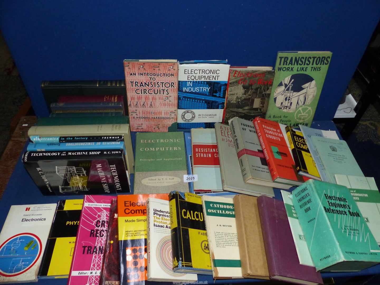 A quantity of books on electronic equipment, transistors, hydraulics, etc.