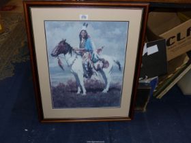 A large framed and mounted Print of a Native American Indian on his horse by Howard Terpning titled