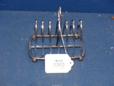 A Silver Toast rack on ball feet, Sheffield 1899, makers Joseph Rodgers & Sons, 150g.