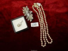 A hair slide, Monet pearl necklace and Baroque pearl pendant.