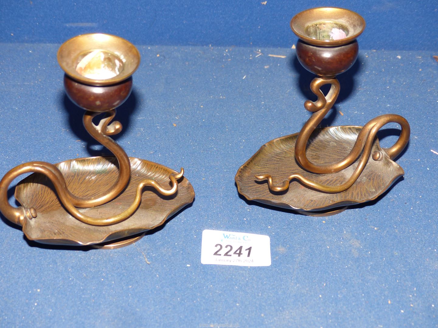 Two candlesticks with Lily pad base.