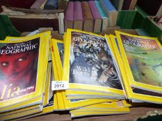 A quantity of National Geographic Magazines from the late 1960's.
