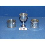 Two Silver napkin rings, one with wreath design, Birmingham,