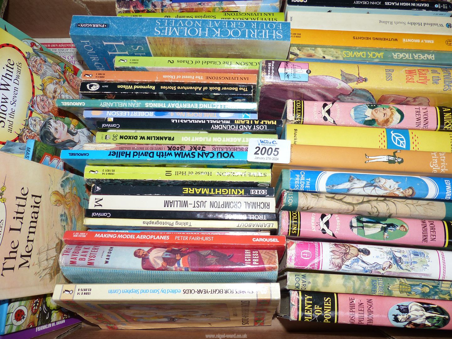 A quantity of mostly Children's books to include 'Plenty of Ponies' , 'Trucker's by Terry Pratchet,