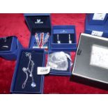 A small quantity of boxed Swarovski jewellery including Star droppers,