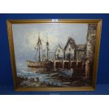 A framed Oil on canvas depicting a harbour scene with huts on the quay and fishing boats,