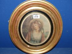 An oval framed coloured Engraving of 'The Shepherdess' by G. Sidney Hunt, 12 1/2" x 14 1/2".