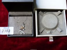 An individually boxed Clogau 925 silver fairy pendant on chain and 'Kensington' lock heart bracelet.