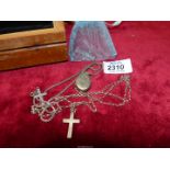 A wooden box containing a small quantity of silver jewellery including two silver crucifix (one