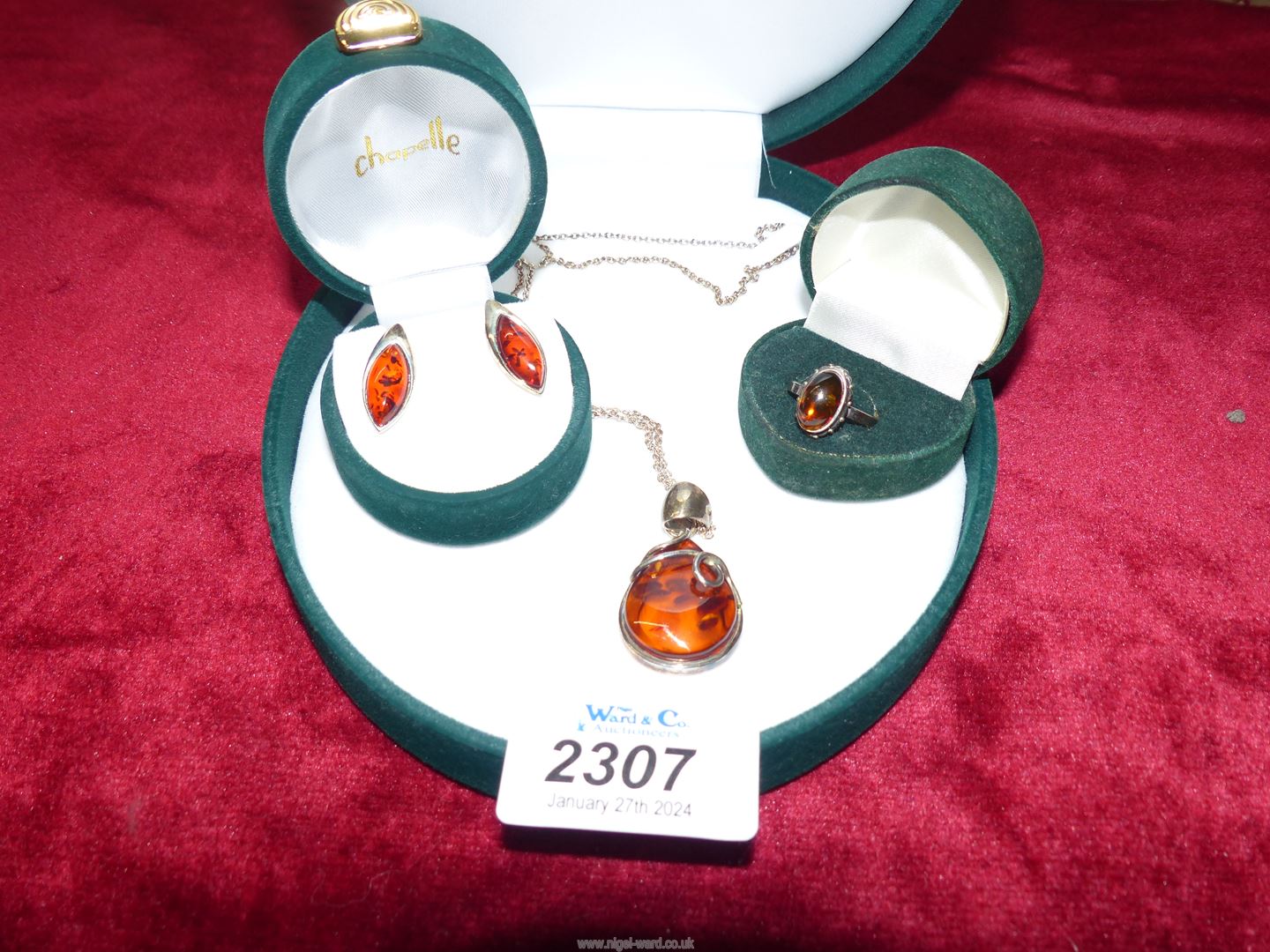 A silver and amber effect pendant, chain and earring set and a 925 silver and amber ring, - Image 3 of 3
