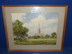 A framed and mounted Watercolour of Norwich Cathedral, signed lower left C.V. Parker.