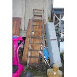 A ten rung wooden step ladder.