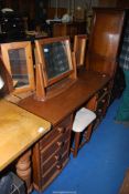 A pine dressing table with tryptic mirror and stool.