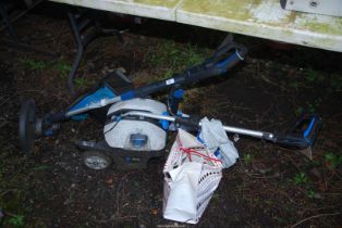 A MacAllister strimmer and lawn mower.