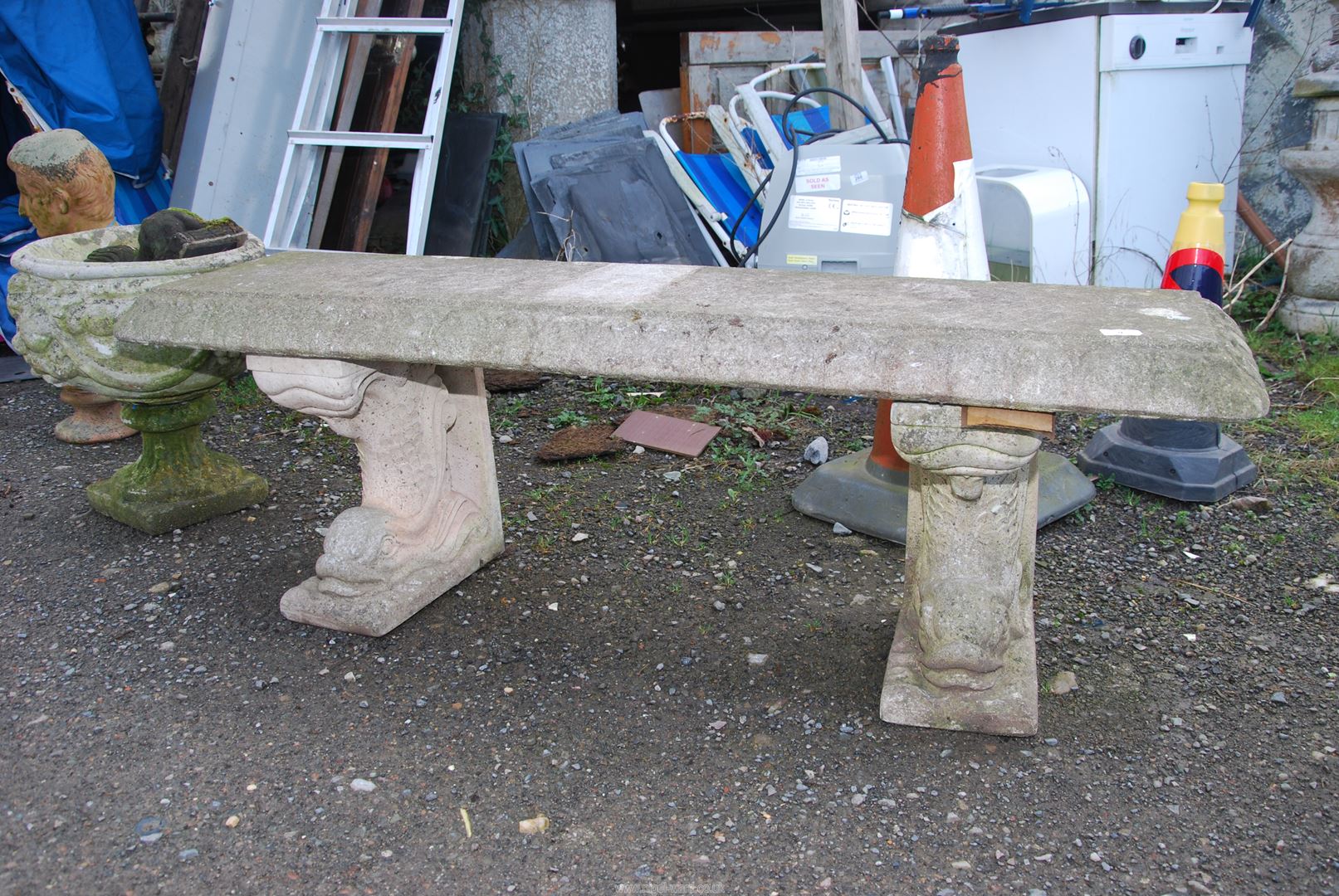 A concrete bench with supports in the form of dolphins, 53'' wide x 15'' deep x 17 1/2'' high. - Image 2 of 2