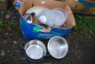 A box of kitchenware.