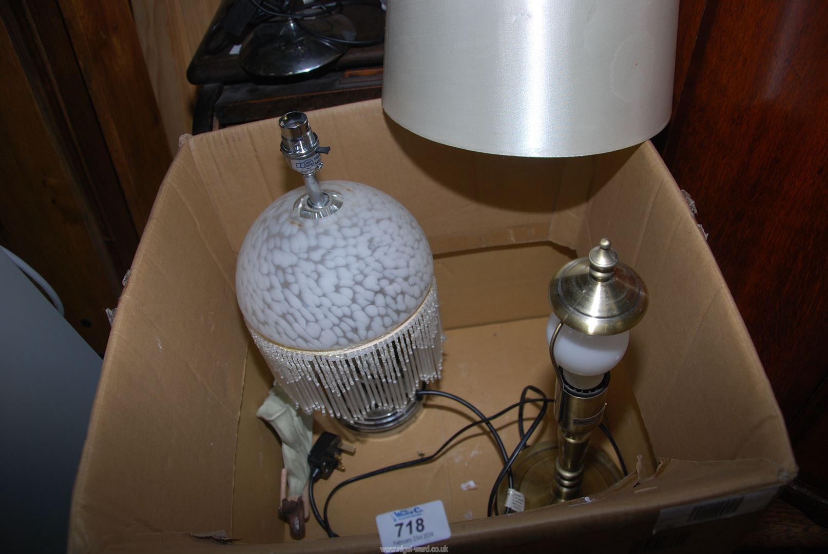 A box of table lamps and shades.