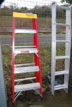 A five rung aluminium step ladder.