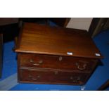 An oak chest with faux drawer front, 27'' wide x 18'' deep x 16'' high.