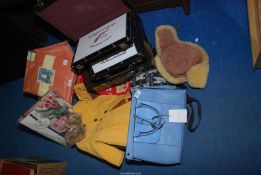 Two boxes of handbags, hats,