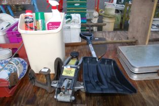 A shoe last, bug killer, a one tonne hydraulic jack (no handle) and snow shovel.