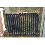 A black painted Radiator, 35'' x 29''.