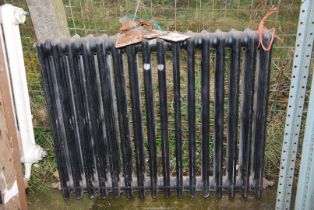 A black painted Radiator, 35'' x 29''.