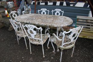 An aluminium table and six chairs.