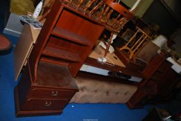 A Mahogany finished G Plan bed head/unit with cupboards to either side fitted with a Binatone radio,