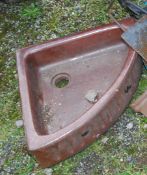A Brown stoneware corner basin.