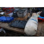 A military RAF Kit Bag and a dog cage.