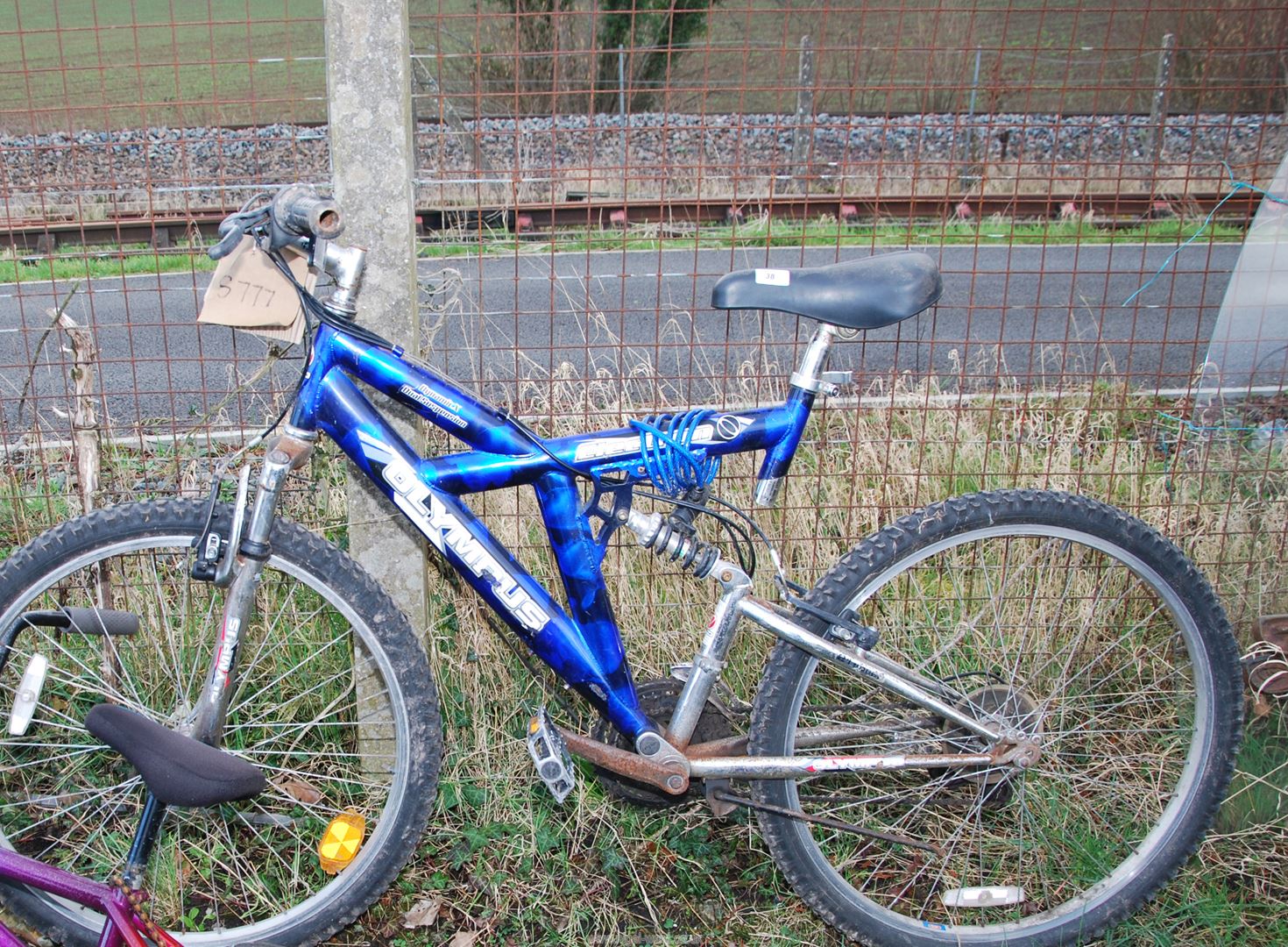 An 18 speed Olympus bicycle.