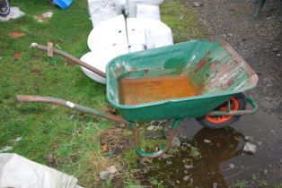 A wheelbarrow with pneumatic tyre.