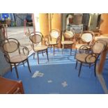 Six 'Dinette' cane seated elbow cafe chairs, all a/f.