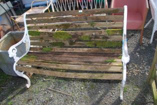 A garden bench with painted bench ends - 49" wide x 32" high.